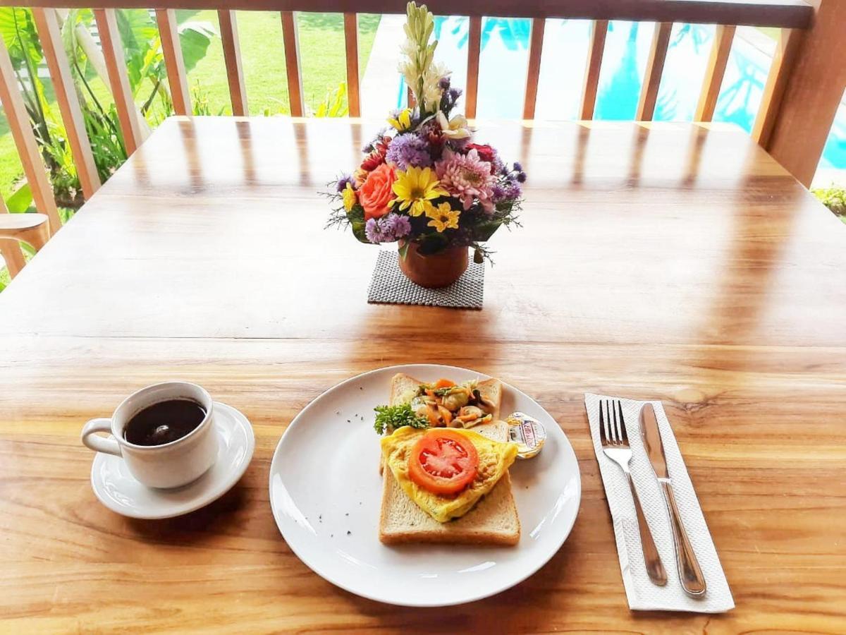 Omorich Bali Guest House Чангу Экстерьер фото